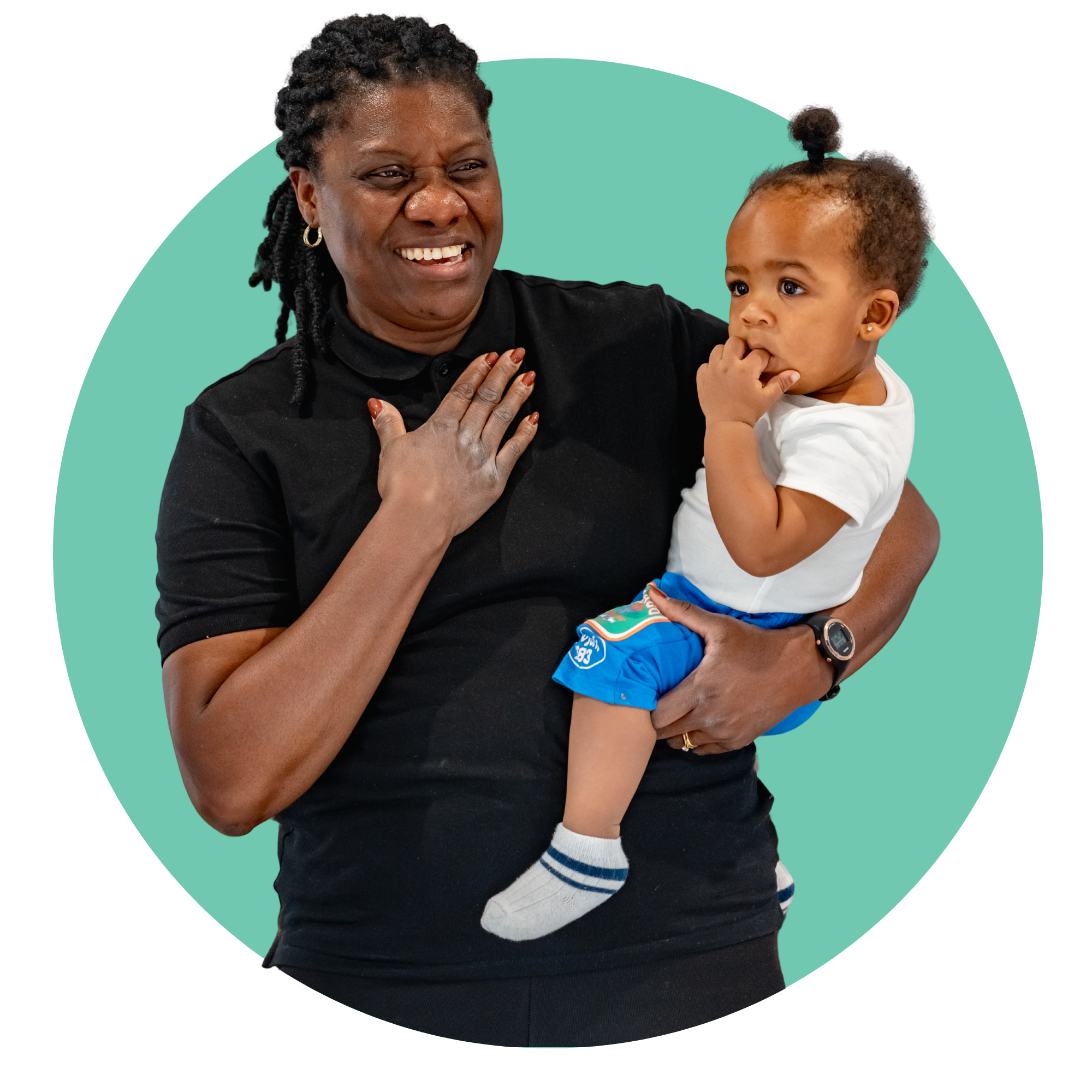 Practitioner Childminder holding a child